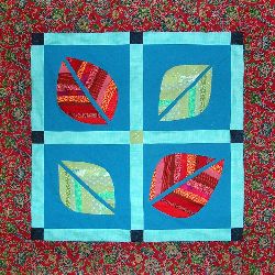 A small quilt, 'Leafcover 2,' by Joy-Lily. Click to enlarge.