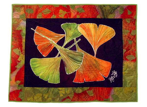 Silk quilt by Joy-Lily of gingko leaves on navy blue. Click to enlarge.