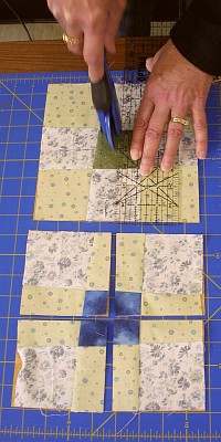 rotary cutting of Mary Lou's quilt squares